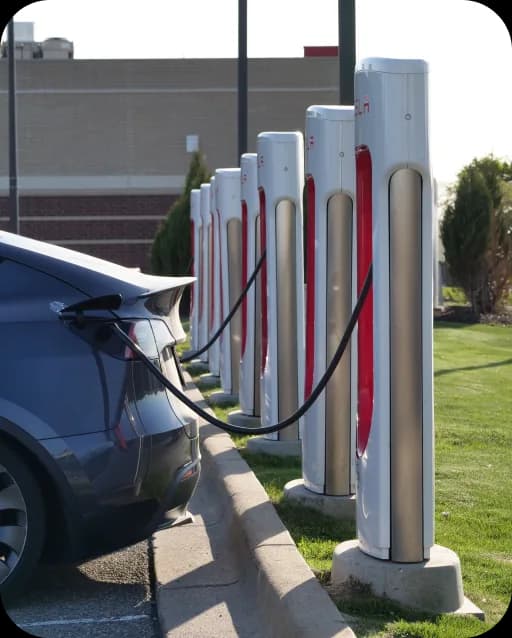 Electric car at a row of charging stations