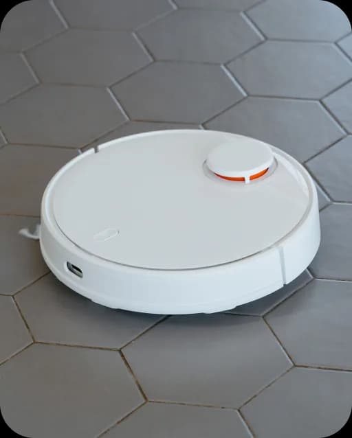 Robot vacuum cleaner on a tiled floor