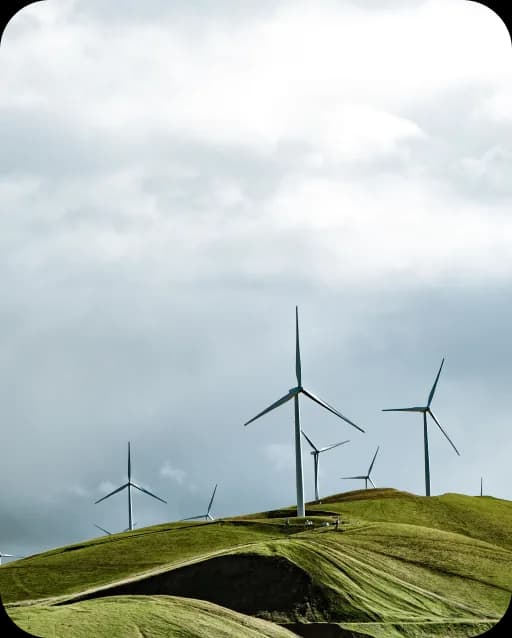 Wind turbines on a green hillside