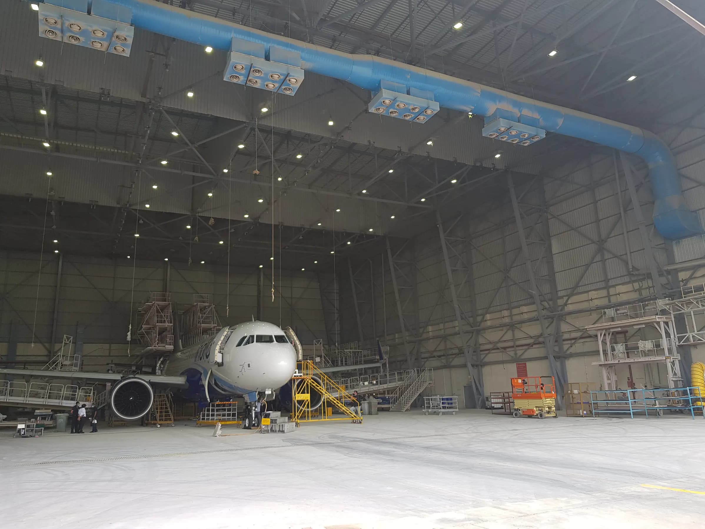 Aircraft inside a paint hangar